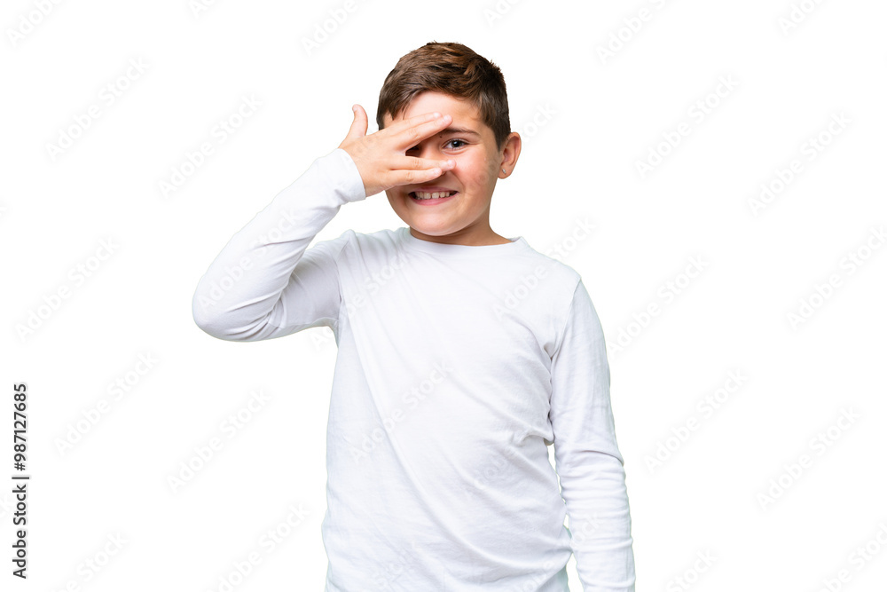 Little caucasian kid over isolated chroma key background covering eyes by hands and smiling Little caucasian kid over isolated chroma key background covering eyes by hands and smiling