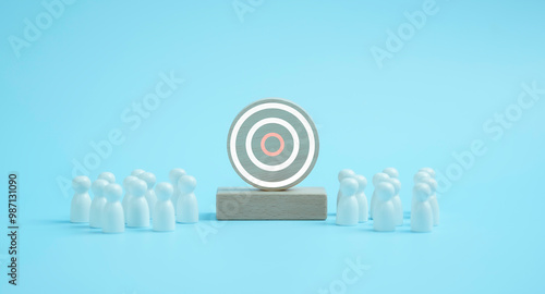 Obraz na płótnie Target concept of business and personnel . white wooden dolls standing around Dart board and arrows for creating and targeting business objectives. Marketing solutions, targets for business w salonie