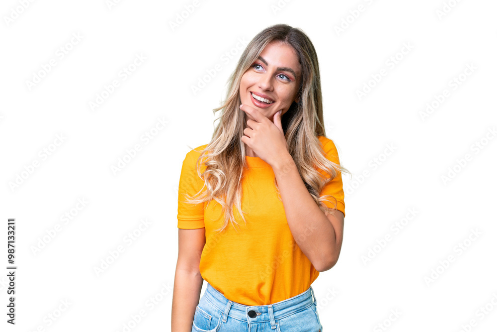 Young Uruguayan woman over isolated background looking to the side and smiling Young Uruguayan woman over isolated background looking to the side and smiling