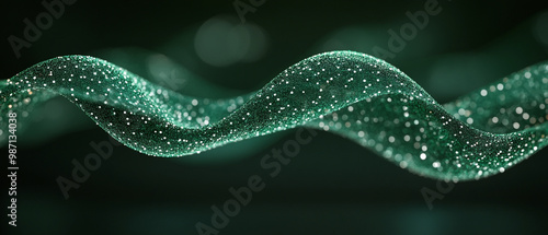 A mesmerizing wave of vibrant green particles dances against a dark backdrop, creating a sense of depth and tranquility.