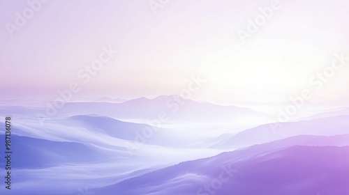 Misty Mountain Ranges at Sunrise with a Soft Purple Hue