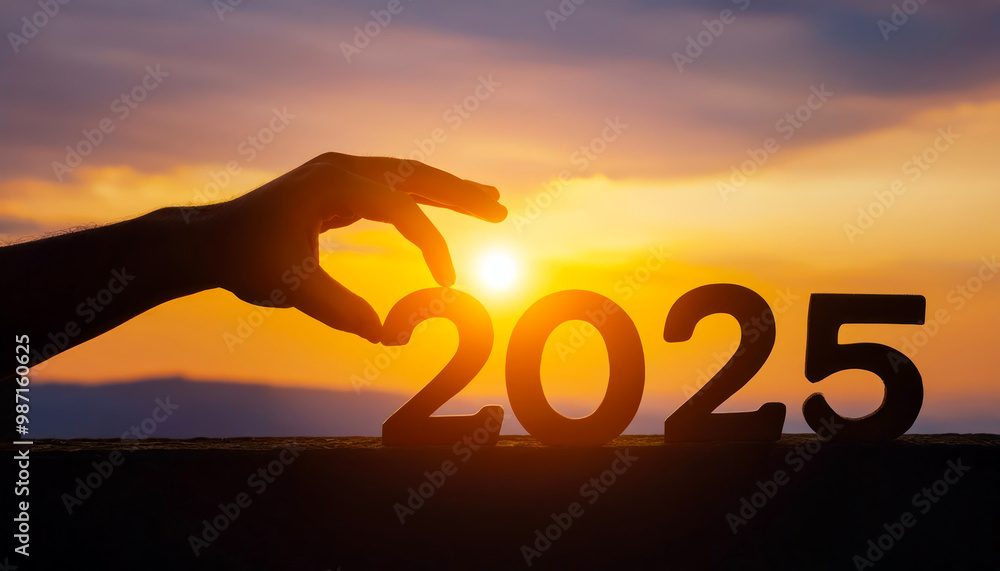 Man hand on sunset sky with number 2025 new year background. Happy new year and holiday Man hand on sunset sky with number 2025 new year background. Happy new year and holiday
