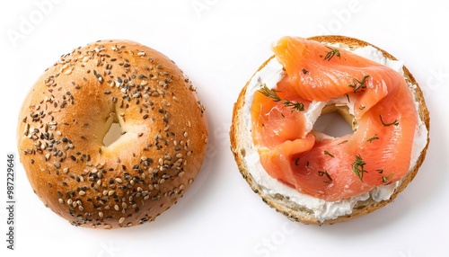 A delicious homemade new york city jewish deli style poppy sesame seed bagel with cream cheese and lox or smoked fish both halves ready to eat isolated on white background with copy space
