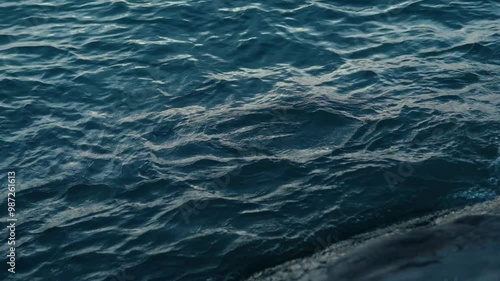 waving water lake and sky sunset slow motion