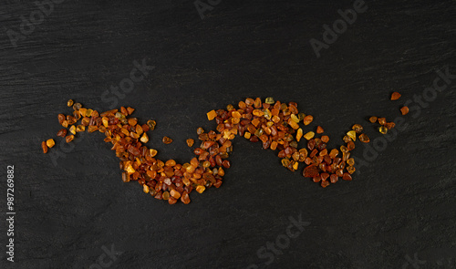 Amber stones, polished orange gemstones, natural Baltic amber gems, golden fossilized tree resin photo