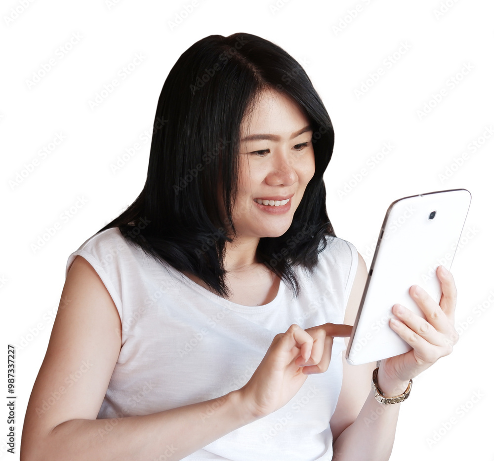 Smiling Asian young woman relaxing with tablet for online shopping Smiling Asian young woman relaxing with tablet for online shopping