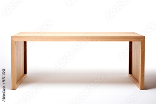 A modern minimalist desk made from light wood with a sleek, rectangular design