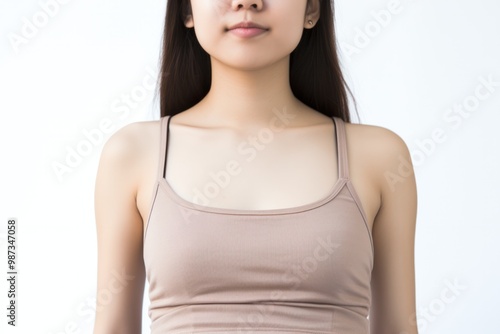 A person wearing a cropped tank top