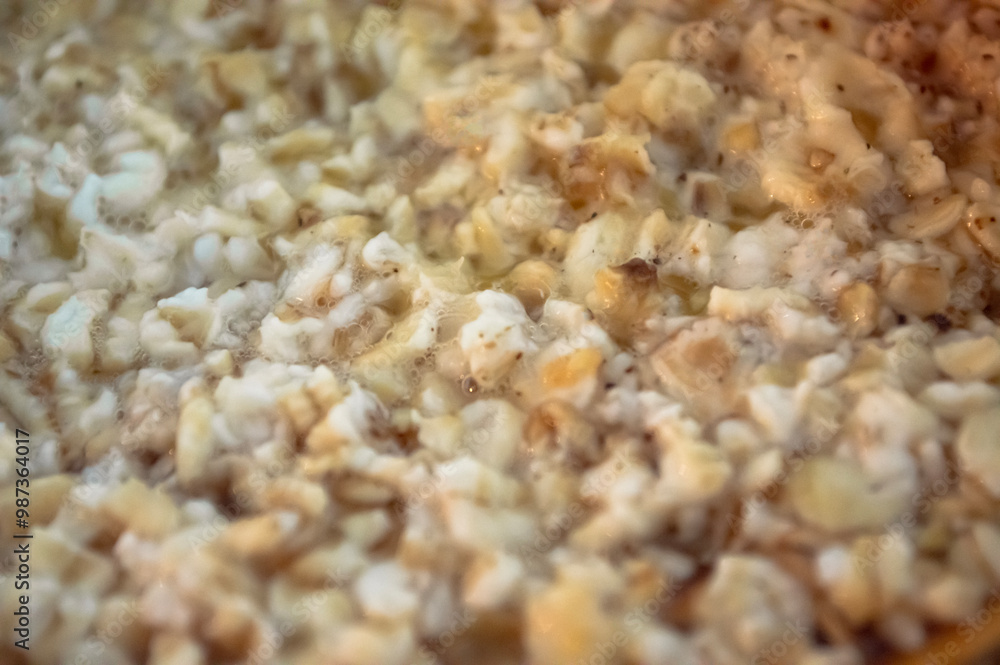 Close up oatmeal. Oats texture. Breakfast ingredient. Nutrient rich Close up oatmeal. Oats texture. Breakfast ingredient. Nutrient rich