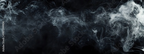 A large black background with white smoke