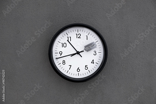 Wallpaper Mural photo of a clock with a razor attached to the seconds Torontodigital.ca