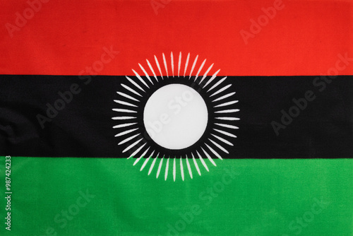 National flag of the state of Malawi close up. State background. photo