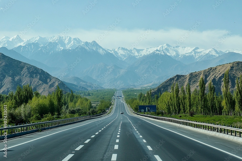 Naklejka premium The highway is quiet and looks like a beautiful mountain .generative ai