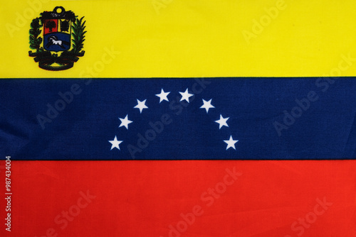 National flag of the state of Venezuela close-up. State background.