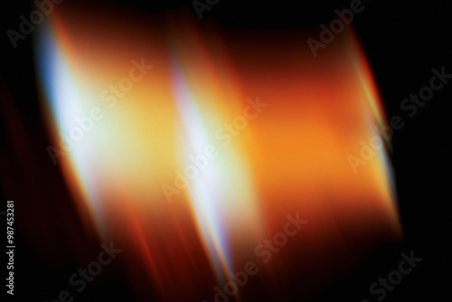 Warm, grainy light leaks with motion blur, and subtle grain; perfect for enhancing photos with a light overlay effect.
