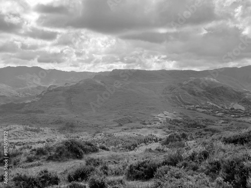 Green hills and mountains in Ireland, summer landscape, black and white monochrome grayscale photo