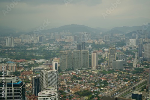 Photography View of Kuala Lumpur cityscape during cloudy weather