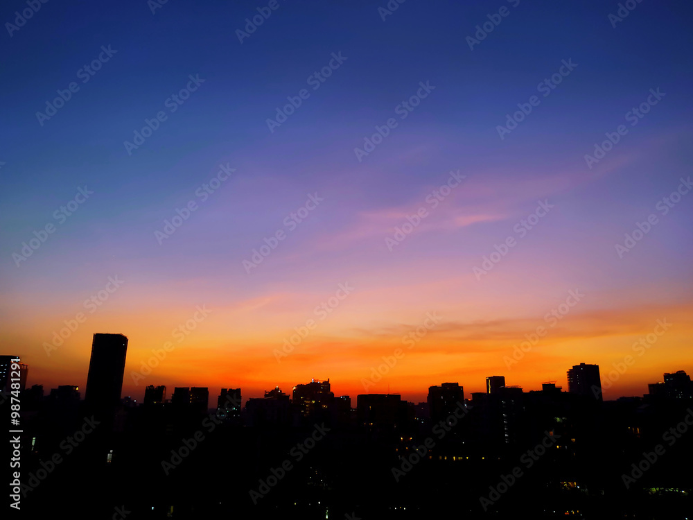 Naklejka premium The beautiful sunset over city.