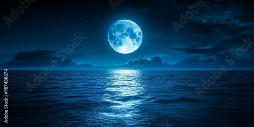 Serene night ocean view with luminous full moon reflecting on calm waters.