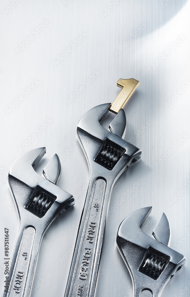 Luxurious number 1 and wrench image.