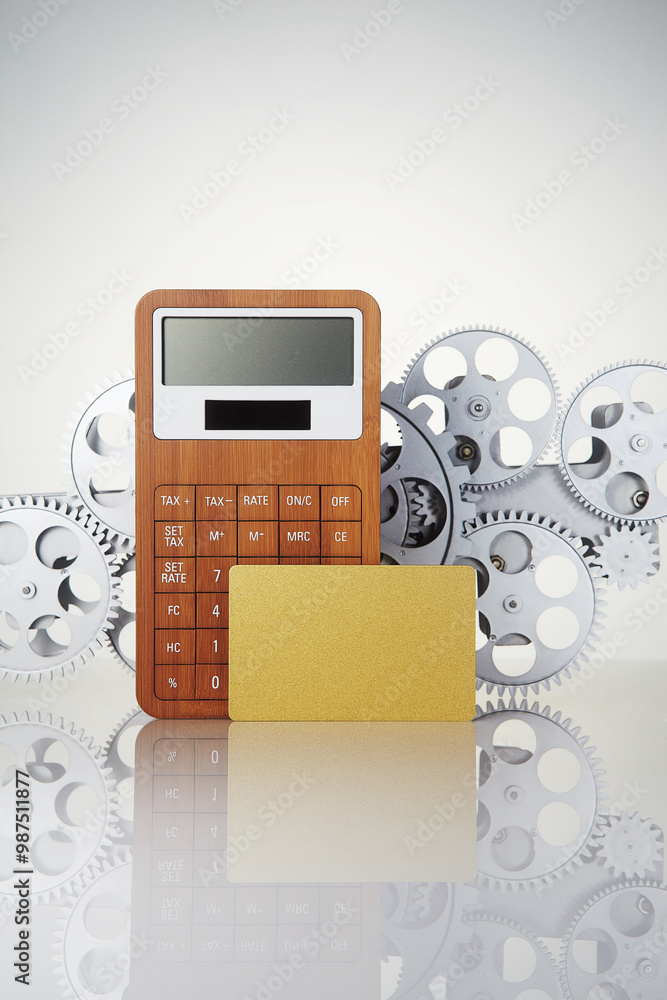 Calculator and card on a white background.