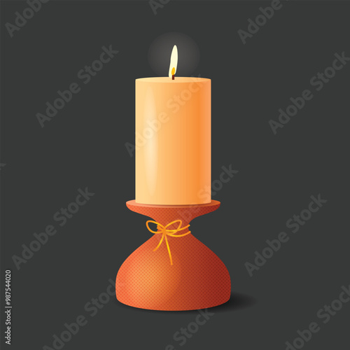 Wax candle on a stand, on a dark background.