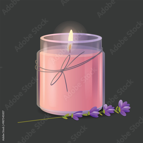 A wax candle is like burning, with flowers next to it. photo