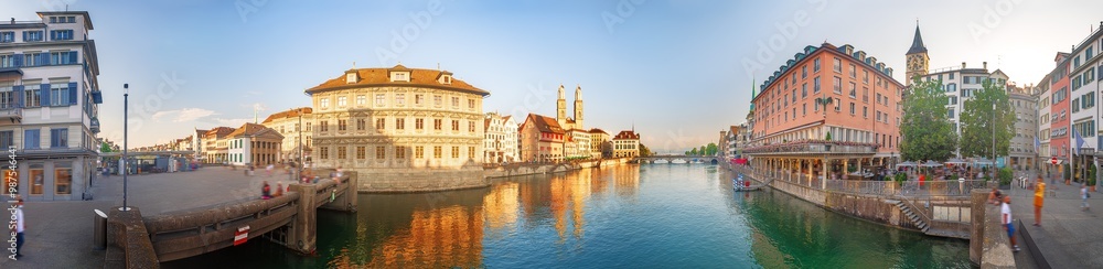 Panoramic view of the old city of Zürich (Zurich) with Limmat river, old town hall and Großmünster cathedral, Switzerland Panoramic view of the old city of Zürich (Zurich) with Limmat river, old town hall and Großmünster cathedral, Switzerland