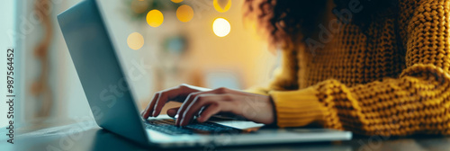 A woman typing on a laptop, focusing on SEO and internet browsing This web page banner represents data search technology and online information retrieval, with copy space photo