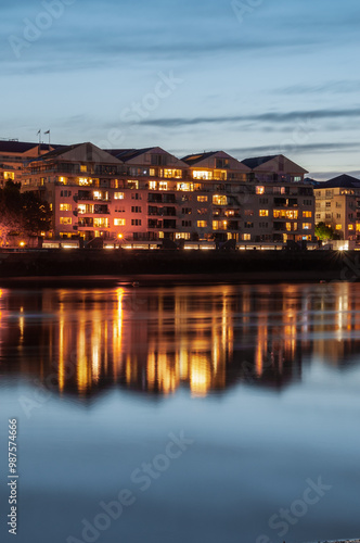 New apartments reflection on River Thames in Londdon