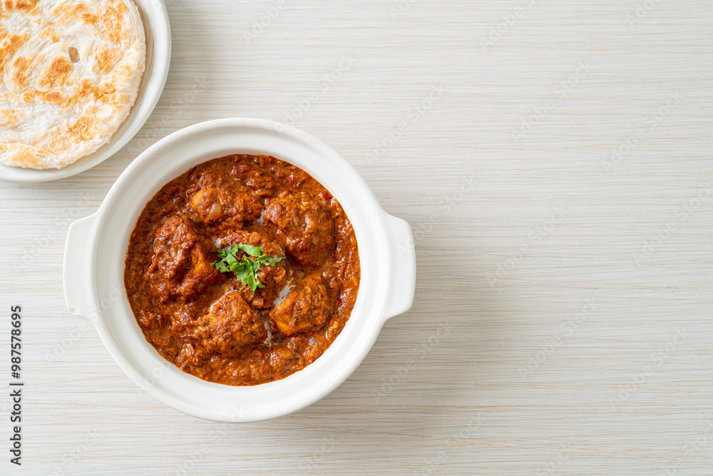 chicken tikka masala spicy curry meat food with roti or naan bread chicken tikka masala spicy curry meat food with roti or naan bread