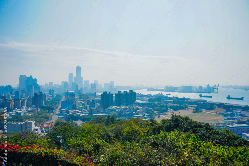 Fototapeta premium Kaohsiung, Taiwan, Republic of China, 01 25 2024: The landscape of Kaosiung port harbor, downtown, taiwan strait, and shoushan mountain 