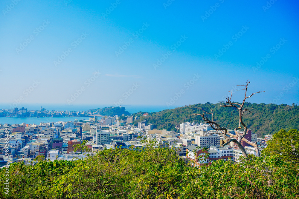 Kaohsiung, Taiwan, Republic of China, 01 25 2024: The landscape of Kaosiung port harbor, downtown, taiwan strait, and shoushan mountain Kaohsiung, Taiwan, Republic of China, 01 25 2024: The landscape of Kaosiung port harbor, downtown, taiwan strait, and shoushan mountain