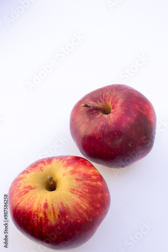 Photography Paula Red apples are vibrant red with some pale yellow tan areas