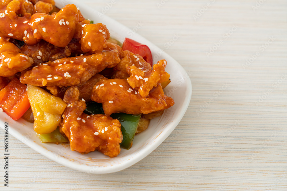 fried crispy chicken with sweet and sour sauce fried crispy chicken with sweet and sour sauce