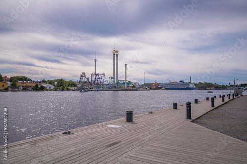 Obraz na plátně Pier view from the island Skeppsholmen, skyline museums and Tivoli on the island