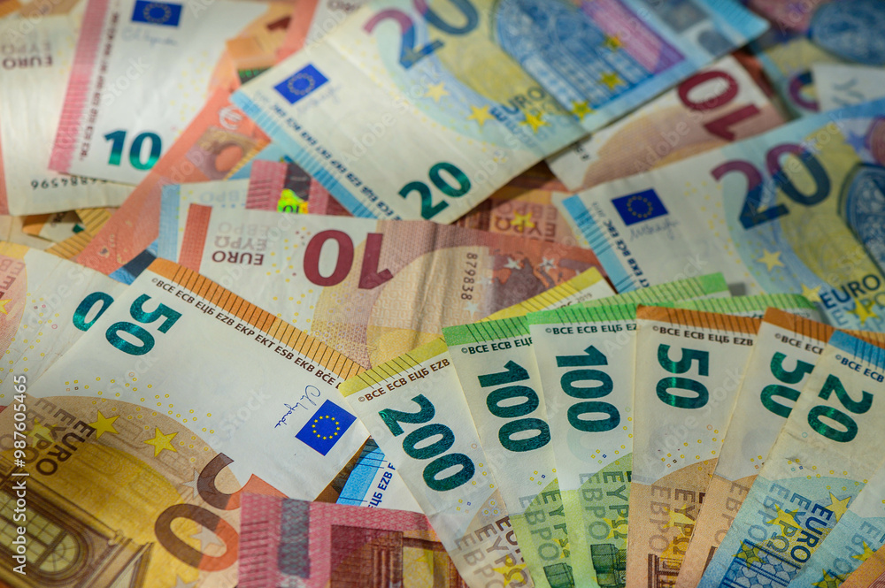 Obraz premium Background of dollar, euro banknotes on a table