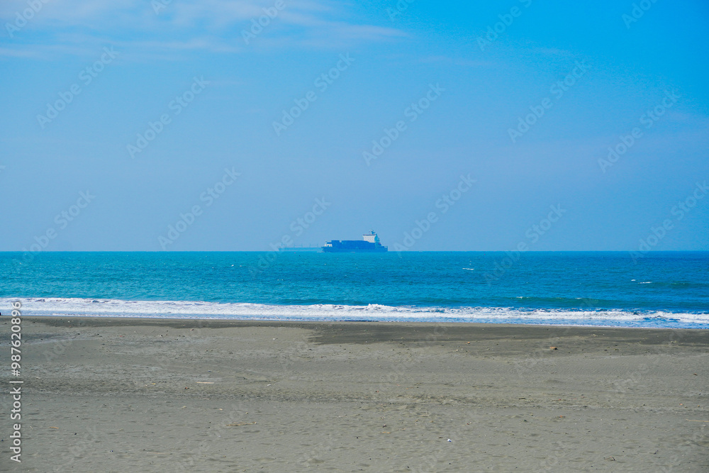 Kaohsiung, Taiwan, Republic of China, 01 25 2024: The landscape of Kaosiung Sizihwan Bay beach in Kaohsiung Kaohsiung, Taiwan, Republic of China, 01 25 2024: The landscape of Kaosiung Sizihwan Bay beach in Kaohsiung