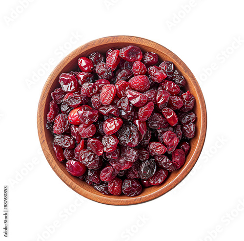 Dried cranberries piled high in a wooden bowl offer a tart and chewy snack