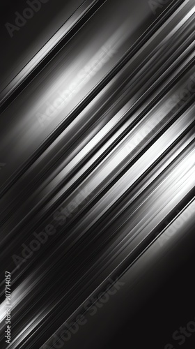 An abstract black and white background featuring sleek, metallic lines creating a dynamic and modern visual effect.