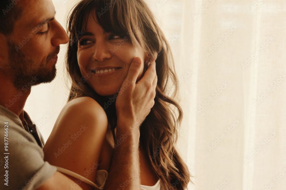 Romantic couple enjoying tender moment together Romantic couple enjoying tender moment together