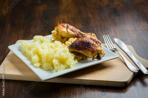 homemade dinner - baked chicken drumsticks with cabbage and potatoes