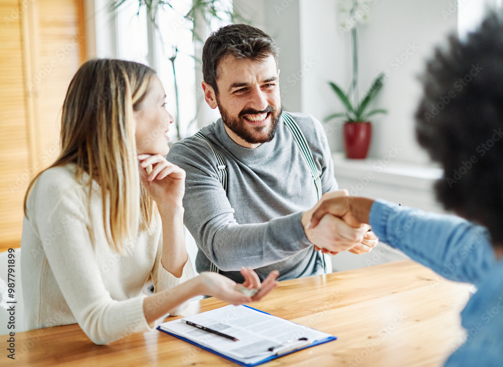 couple woman man client agent handshake agreement young business home estate house deal meeting happy investment hand real mortgage property couple woman man client agent handshake agreement young business home estate house deal meeting happy investment hand real mortgage property