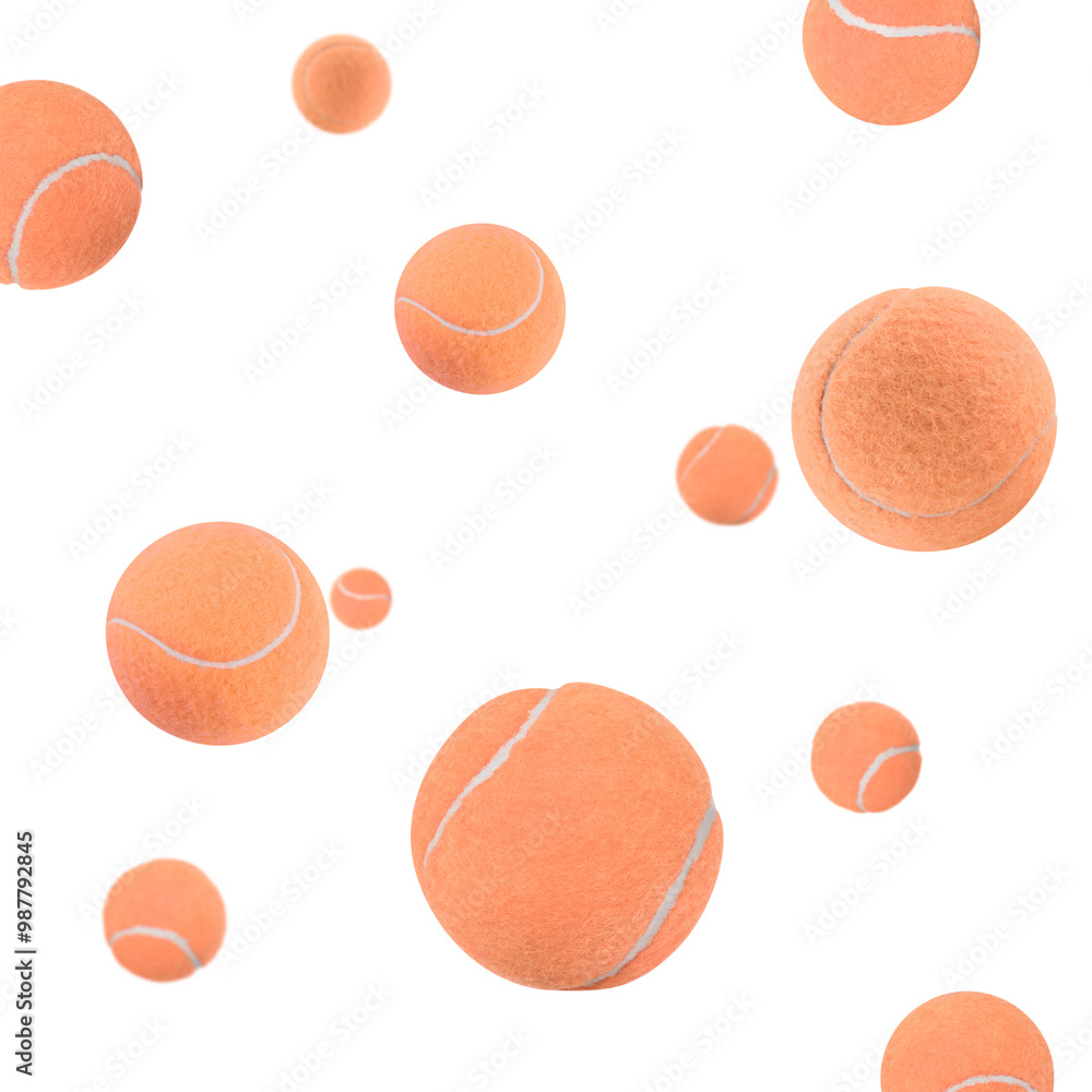 Fototapeta premium Many coral tennis balls flying on white background