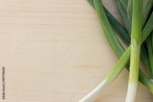 Versatile Allium Vegetable. Leeks, with their mild onion flavor, are a versatile addition to savory dishes. From soups and stews to quiches and stir-fries, these elongated green and white stalks enhan photo