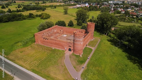 View of the castle in the middle of the forest. Drone view of the castle. A castle in the middle of the forest. The castle in Ciechanów, Poland photo