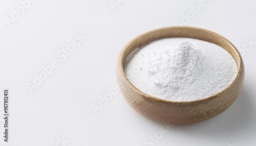 White zinc oxide powder in bowl on white table. Healthcare and medical supplement product.
