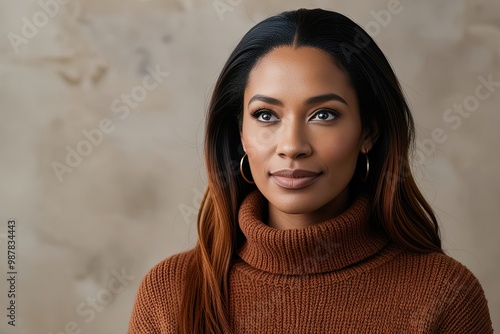 Heartfelt Portrait of a Young Biracial Woman with Chestnut Hair in a Cozy Turtleneck Sweater