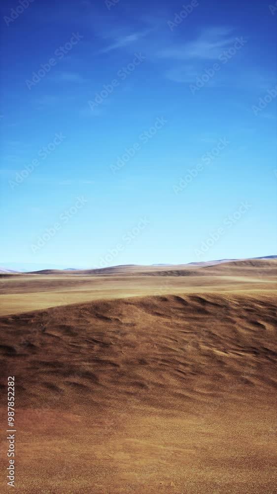 A desolate, empty plain under a clear blue sky, devoid of any life or vegetation. A desolate, empty plain under a clear blue sky, devoid of any life or vegetation.