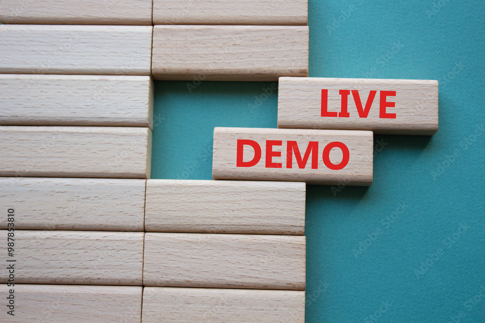Live Demo symbol. Concept word Live Demo on wooden blocks. Beautiful grey green background. Business and Live Demo concept. Copy space Live Demo symbol. Concept word Live Demo on wooden blocks. Beautiful grey green background. Business and Live Demo concept. Copy space